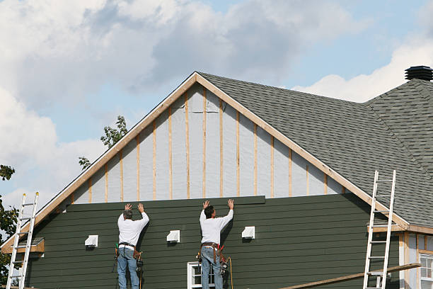 Professional Emergency Siding Repair technician working in Peninsula, OH